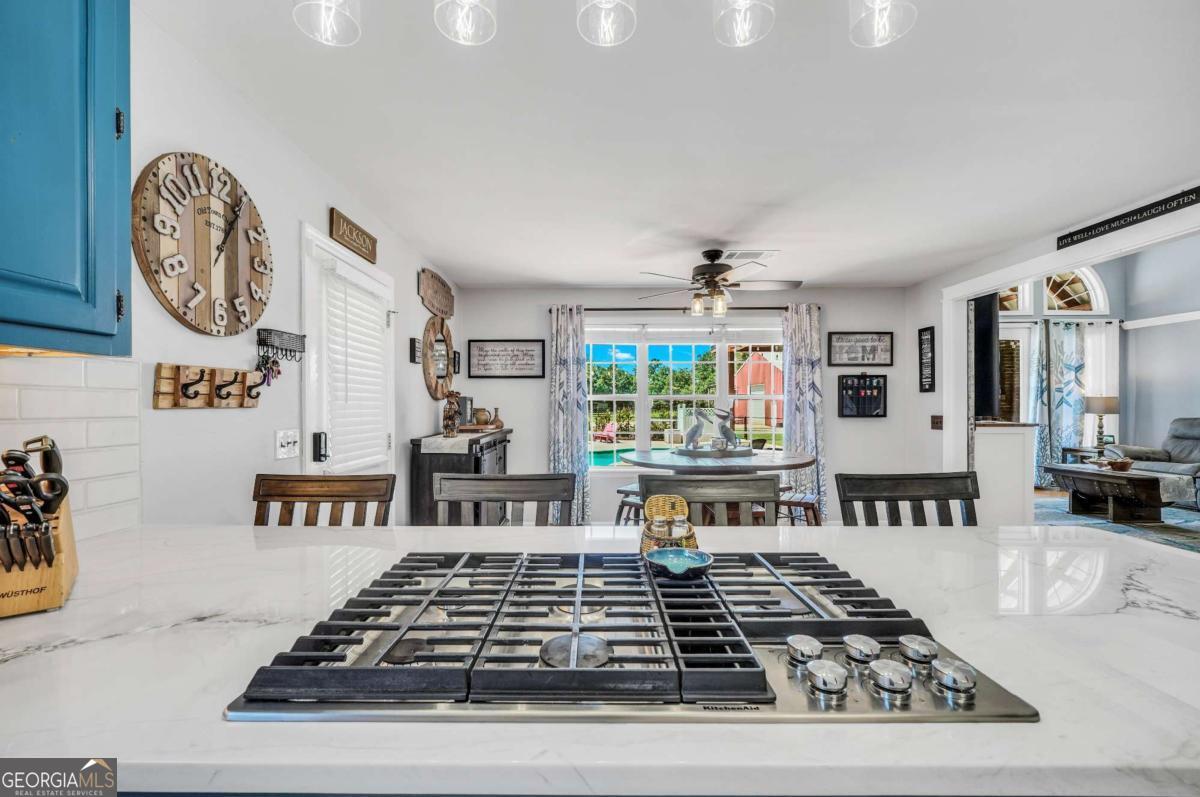 159 County Line Road Locust Grove, GA 30248 - Photo 20 of 100 a kitchen with a stove and a table