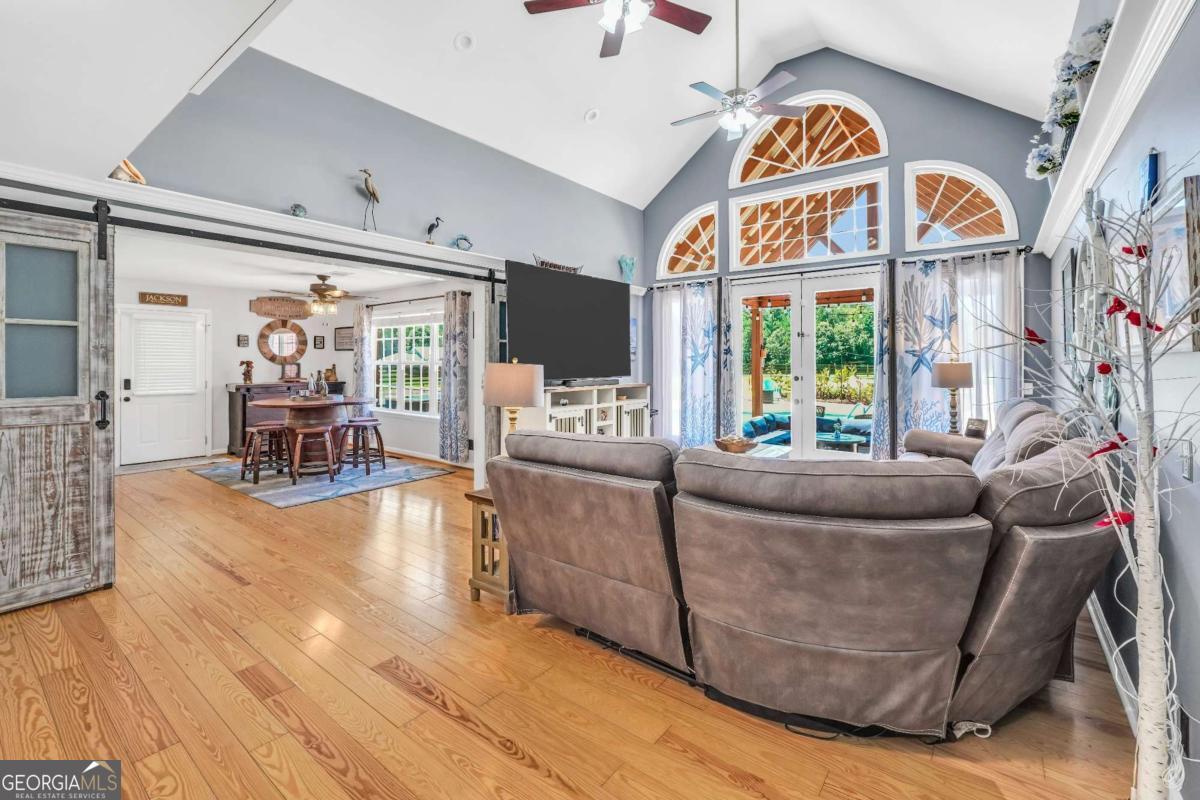 159 County Line Road Locust Grove, GA 30248 - Photo 32 of 100 a living room with furniture and a large window