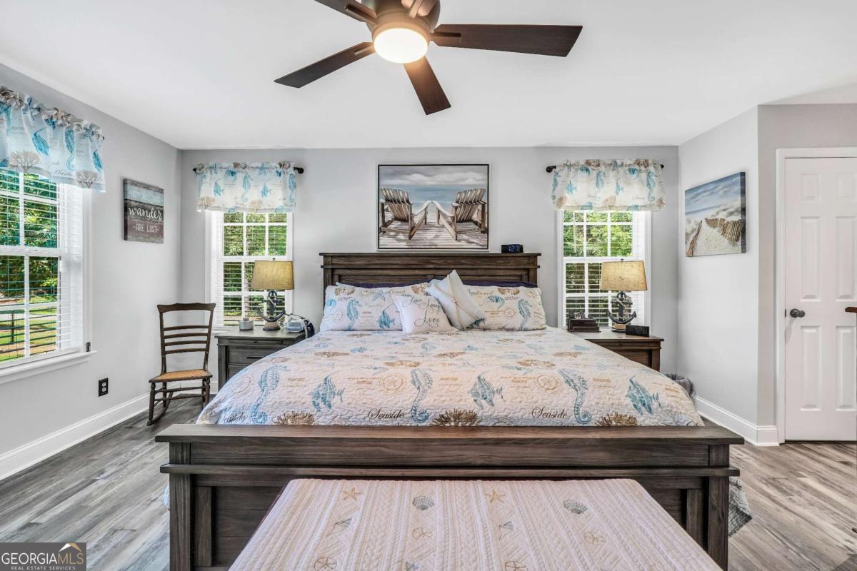 159 County Line Road Locust Grove, GA 30248 - Photo 38 of 100 a bedroom with a bed and wooden floor
