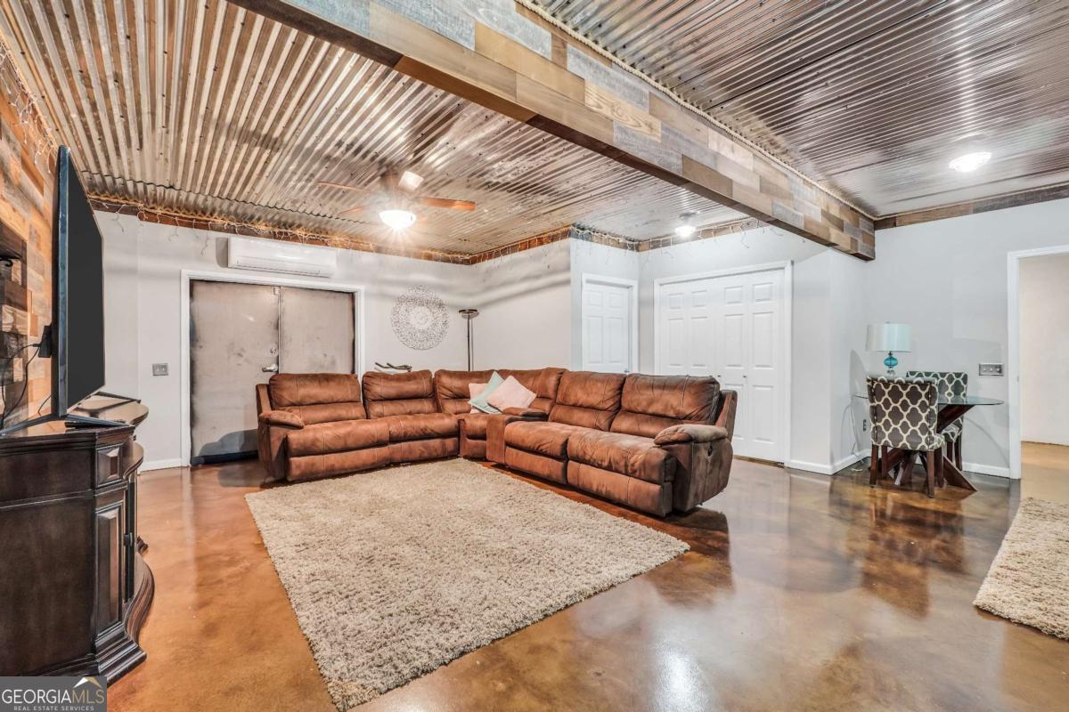 159 County Line Road Locust Grove, GA 30248 - Photo 68 of 100 a living room with furniture and a couch