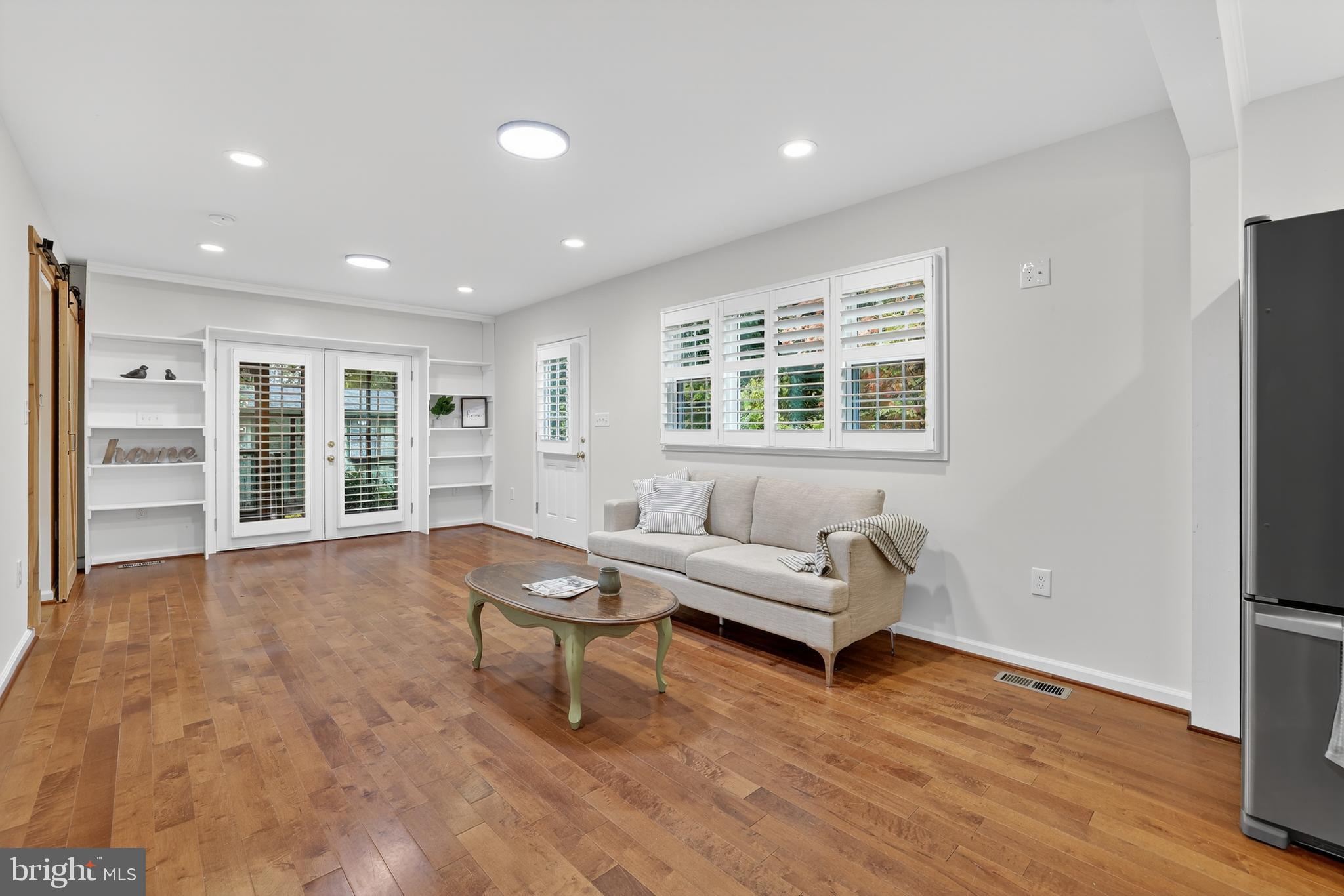 1424 Littlepage Street Fredericksburg, VA 22401 - Photo 15 of 34 a living room with furniture and a large window
