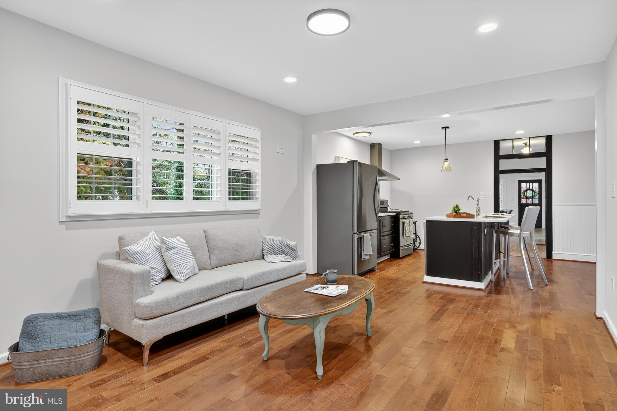 1424 Littlepage Street Fredericksburg, VA 22401 - Photo 16 of 34 a living room with furniture and a window