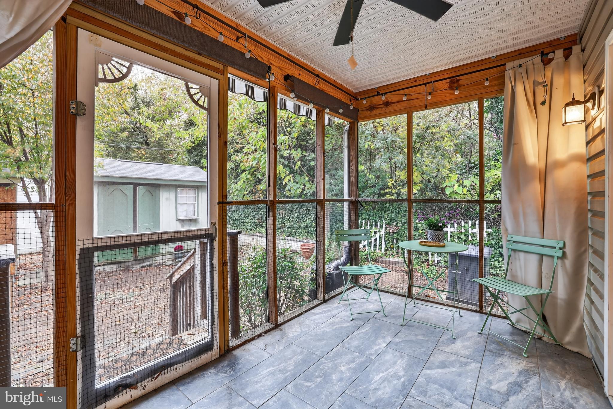 1424 Littlepage Street Fredericksburg, VA 22401 - Photo 18 of 34 a view of an empty room with wooden floor and a floor to ceiling window