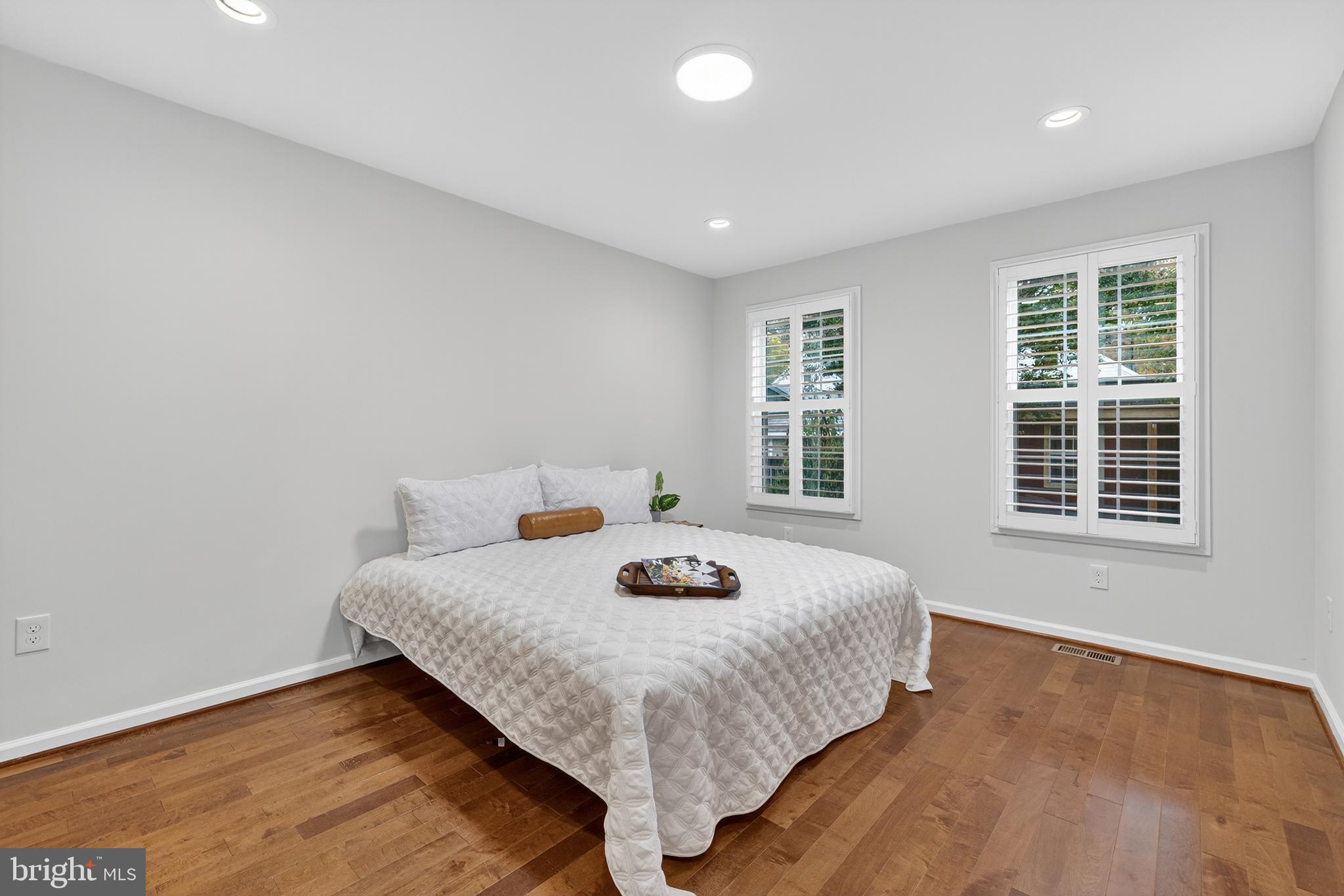 1424 Littlepage Street Fredericksburg, VA 22401 - Photo 19 of 34 a bedroom with a bed and a window