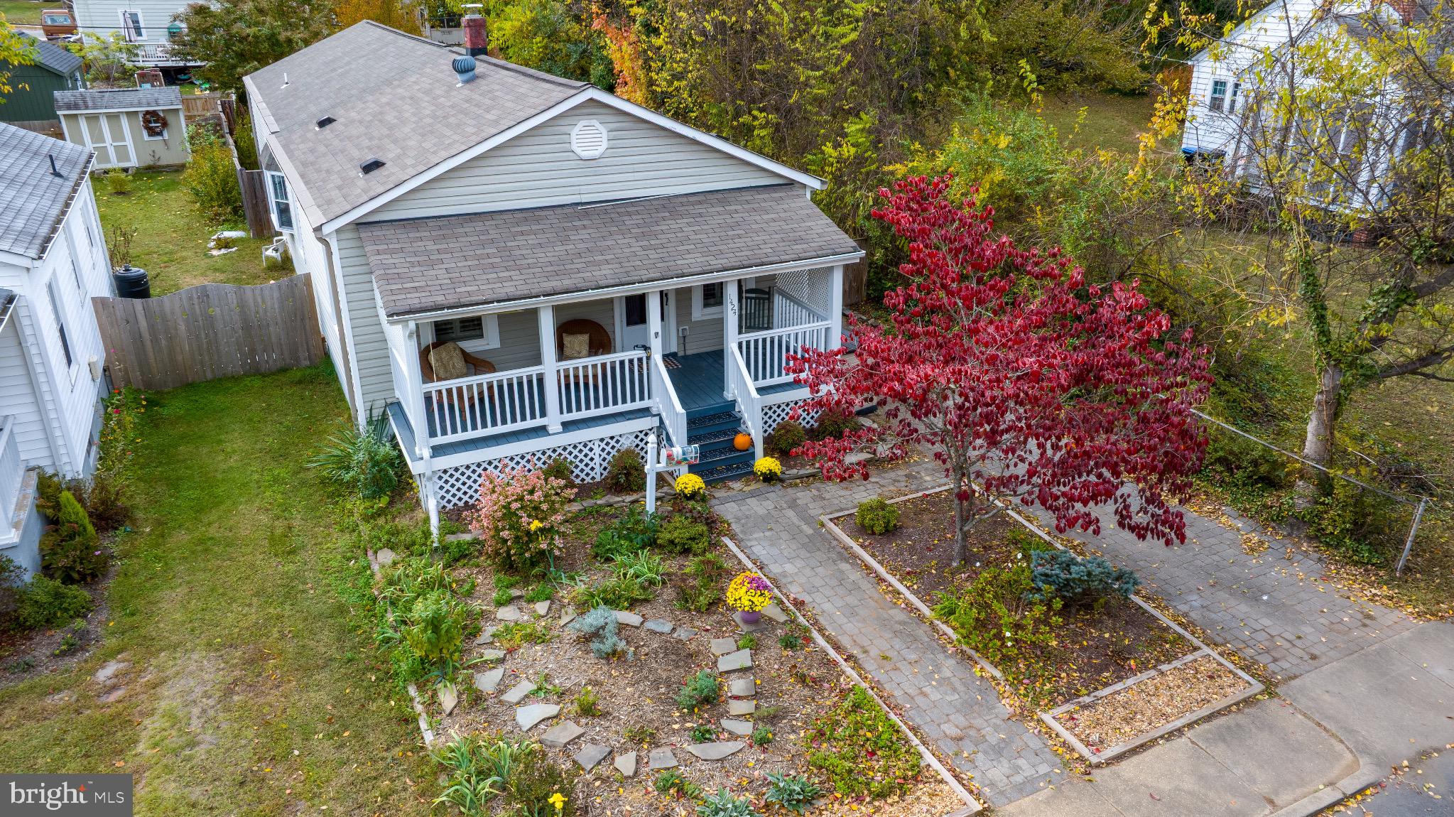1424 Littlepage Street Fredericksburg, VA 22401 - Photo 2 of 34 a view of house with a garden