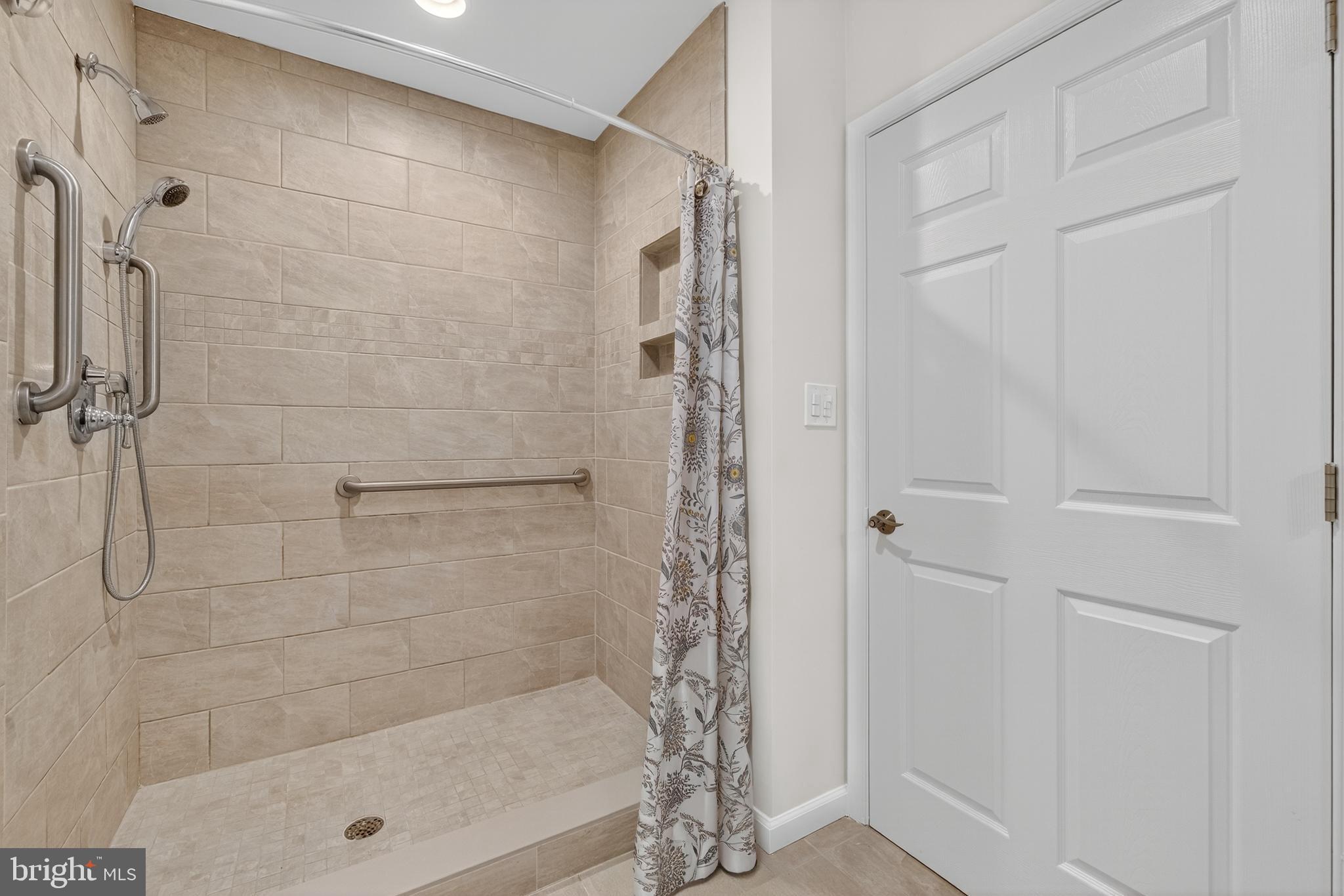 1424 Littlepage Street Fredericksburg, VA 22401 - Photo 23 of 34 a bathroom with a shower
