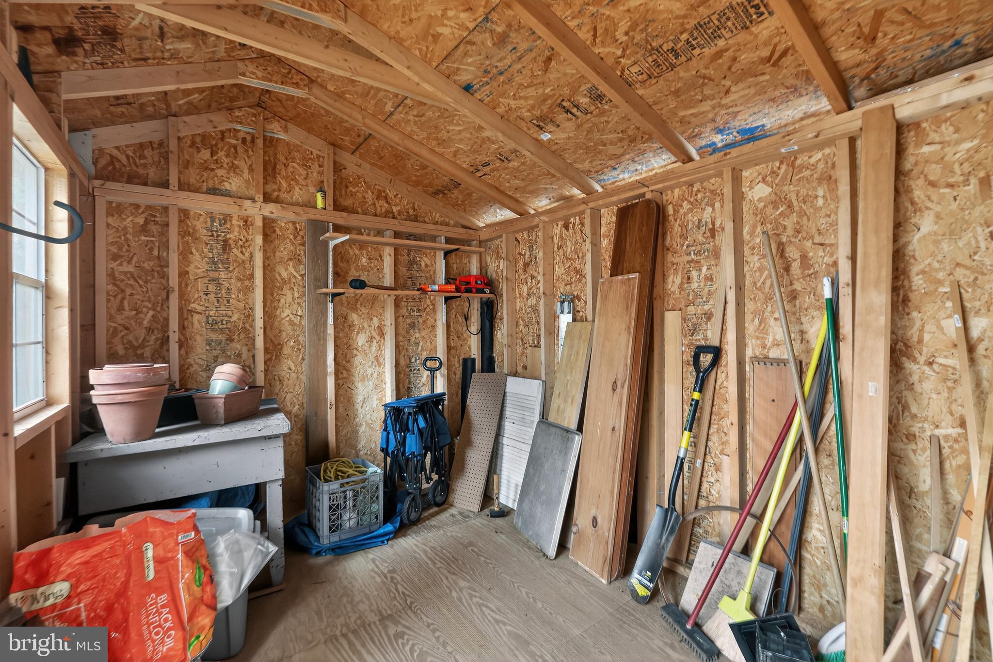 1424 Littlepage Street Fredericksburg, VA 22401 - Photo 27 of 34 a view of walk in closet with clothes and shoes
