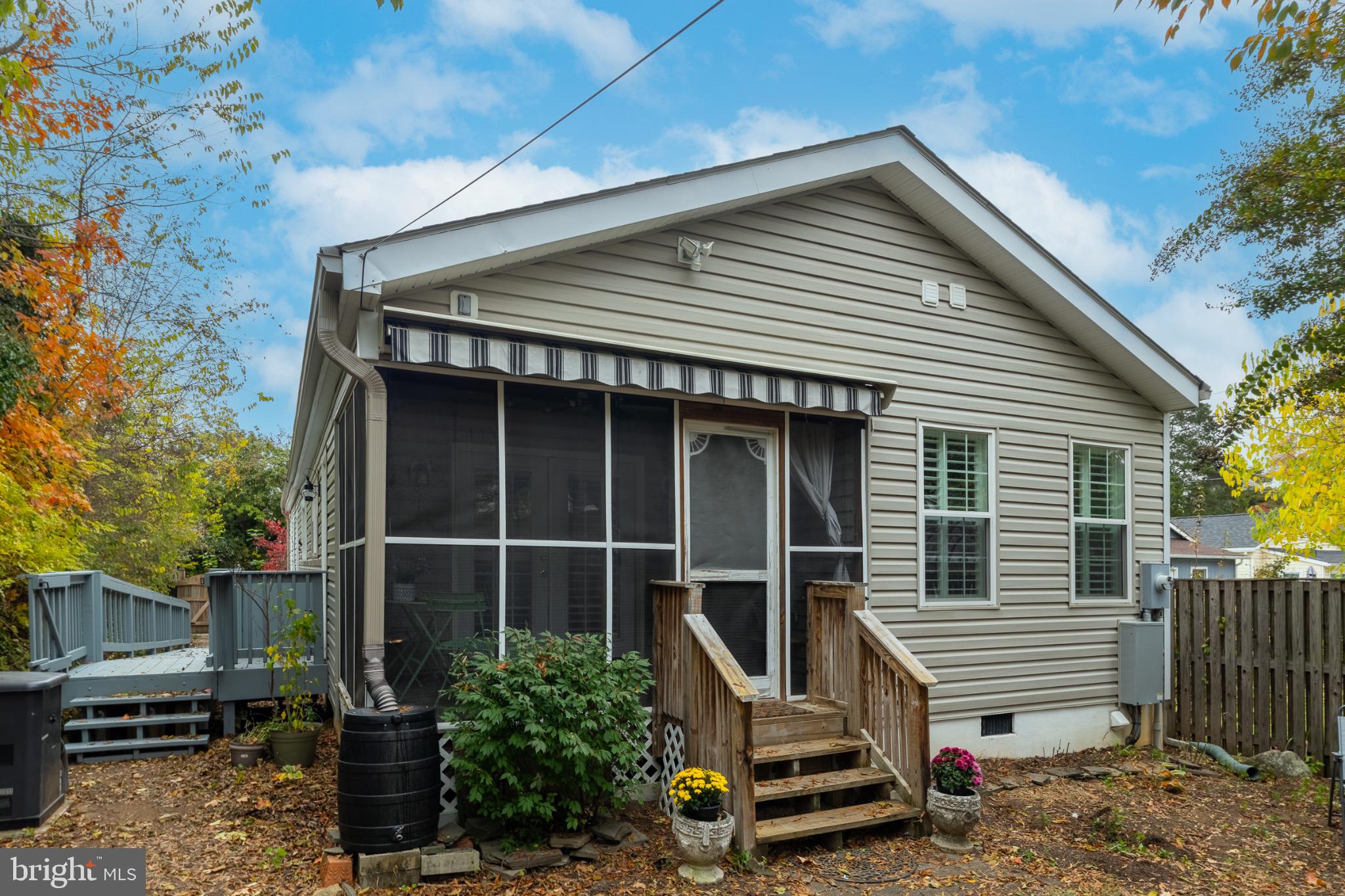 1424 Littlepage Street Fredericksburg, VA 22401 - Photo 29 of 34 a front view of a house with a garden