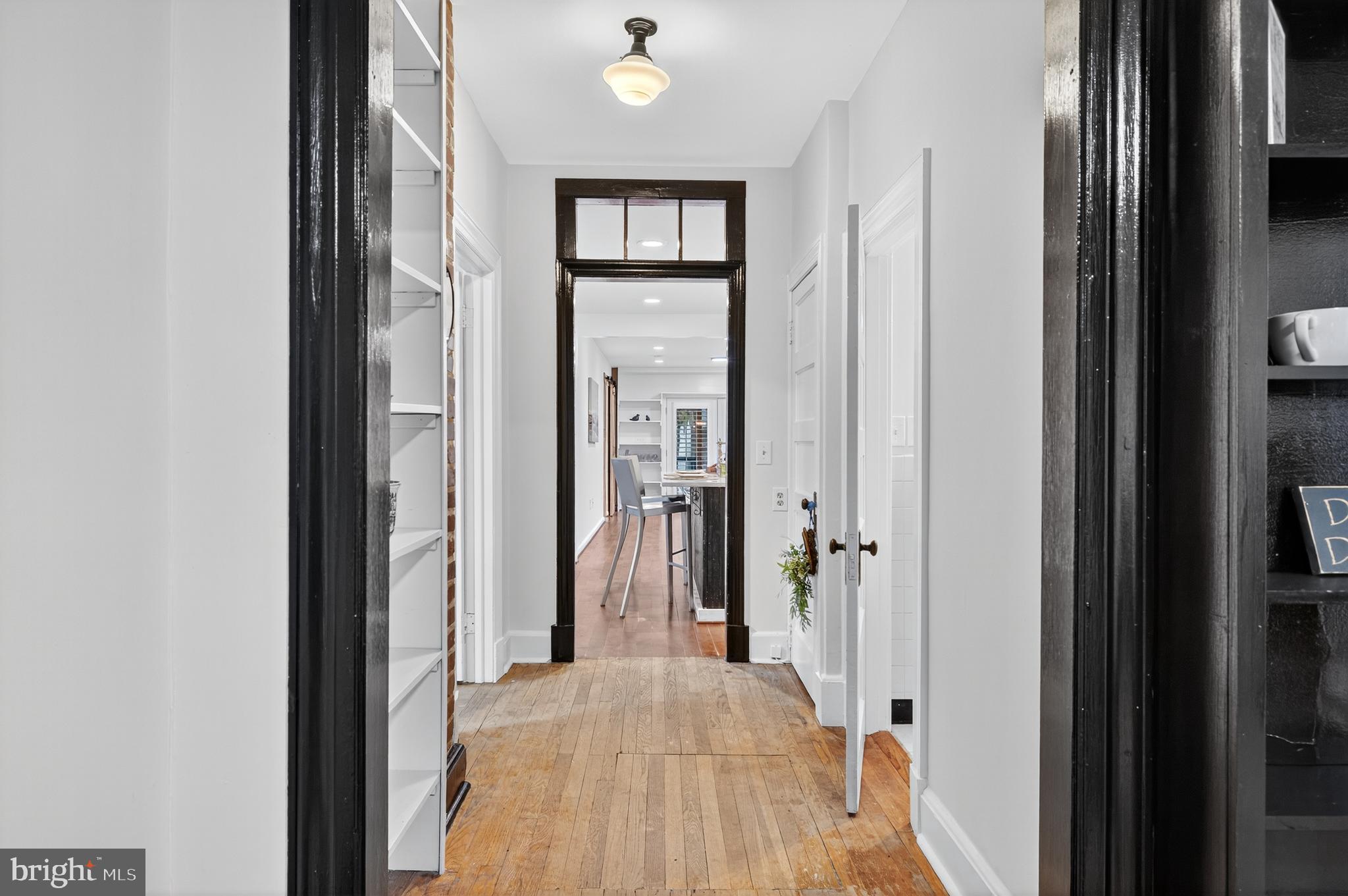 1424 Littlepage Street Fredericksburg, VA 22401 - Photo 6 of 34 a view of a hallway with wooden floor and closet area