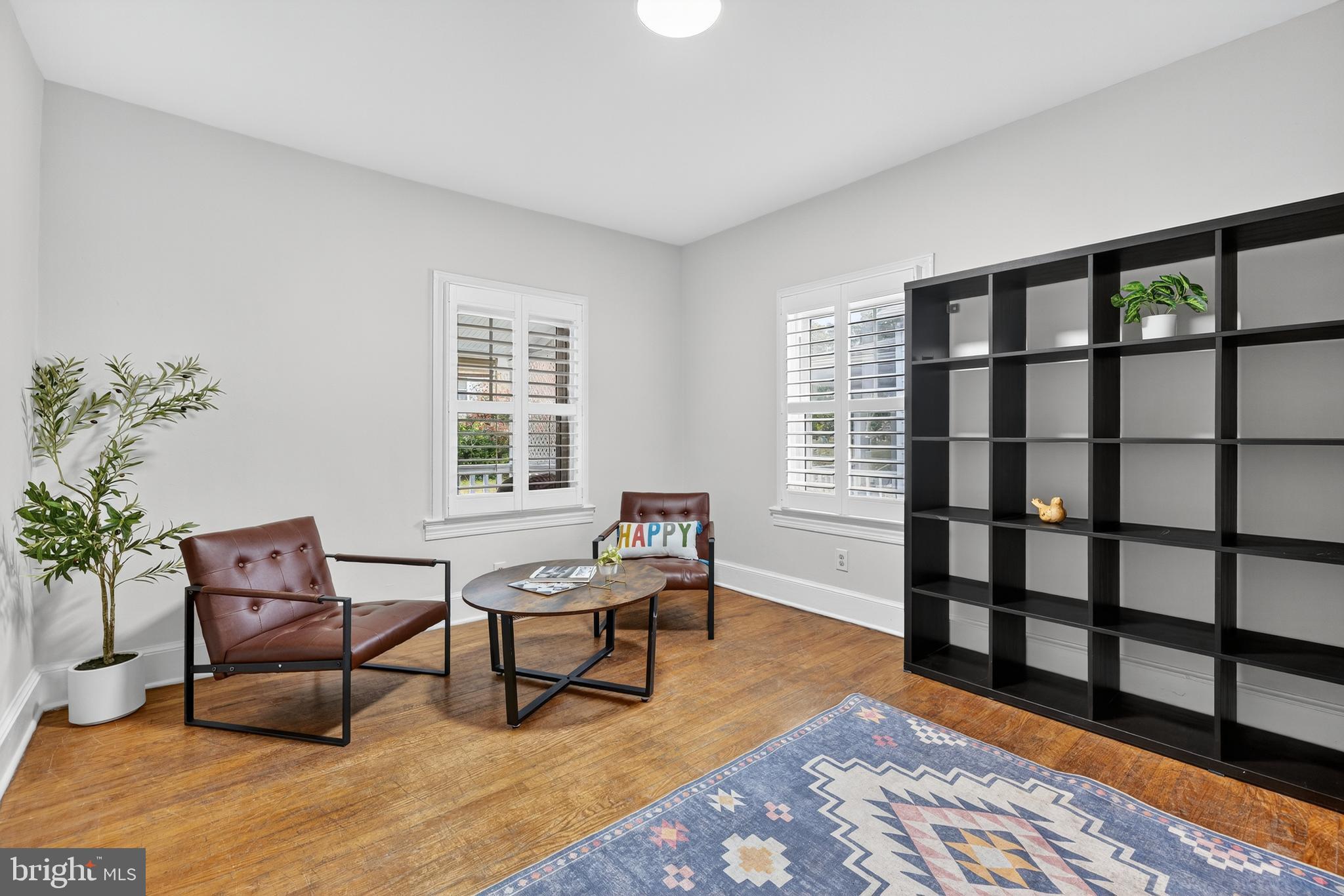 1424 Littlepage Street Fredericksburg, VA 22401 - Photo 7 of 34 a living room with furniture wooden floor and a window