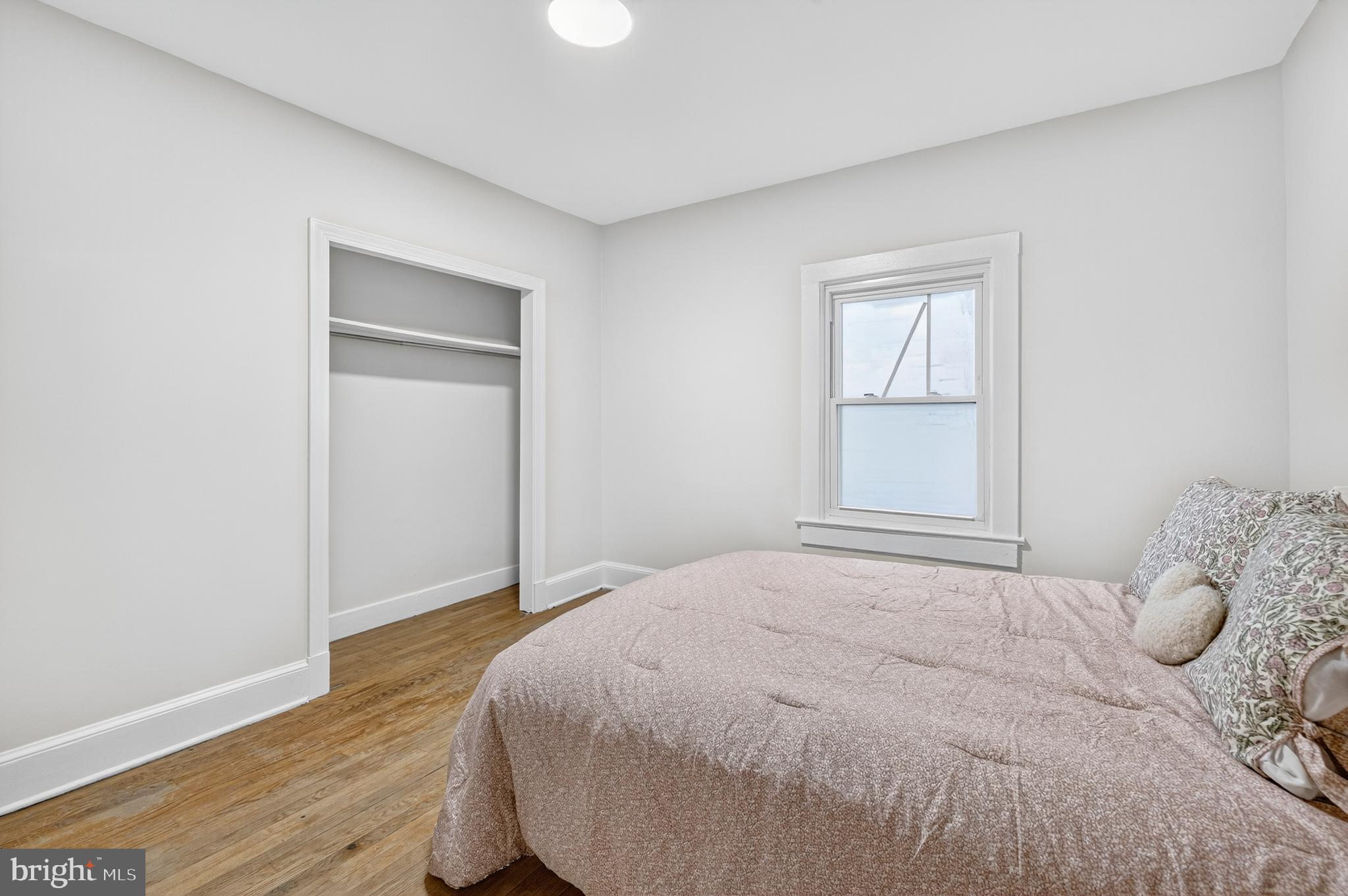1424 Littlepage Street Fredericksburg, VA 22401 - Photo 9 of 34 a bedroom with a bed and a window