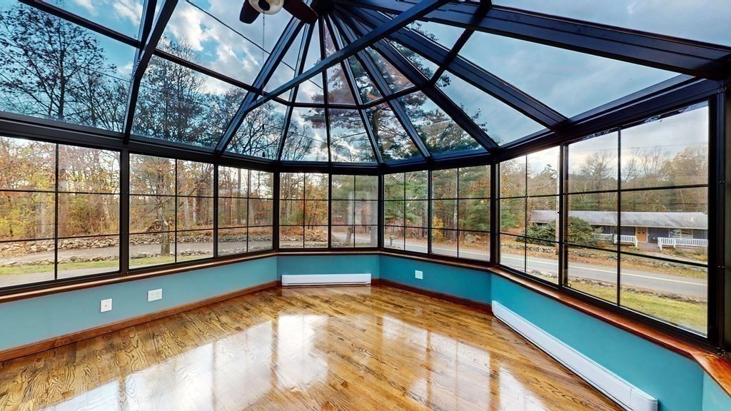 123 Pond Street Georgetown, MA 01833 - Photo 13 of 23 a view of an empty room with a window