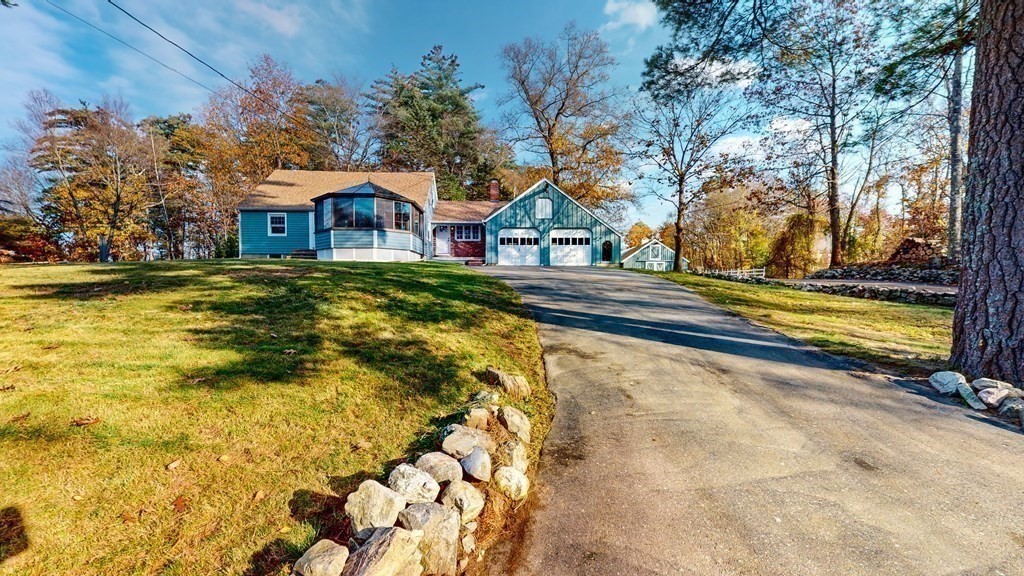 123 Pond Street Georgetown, MA 01833 - Photo 3 of 23 a view of swimming pool with a yard and sitting area