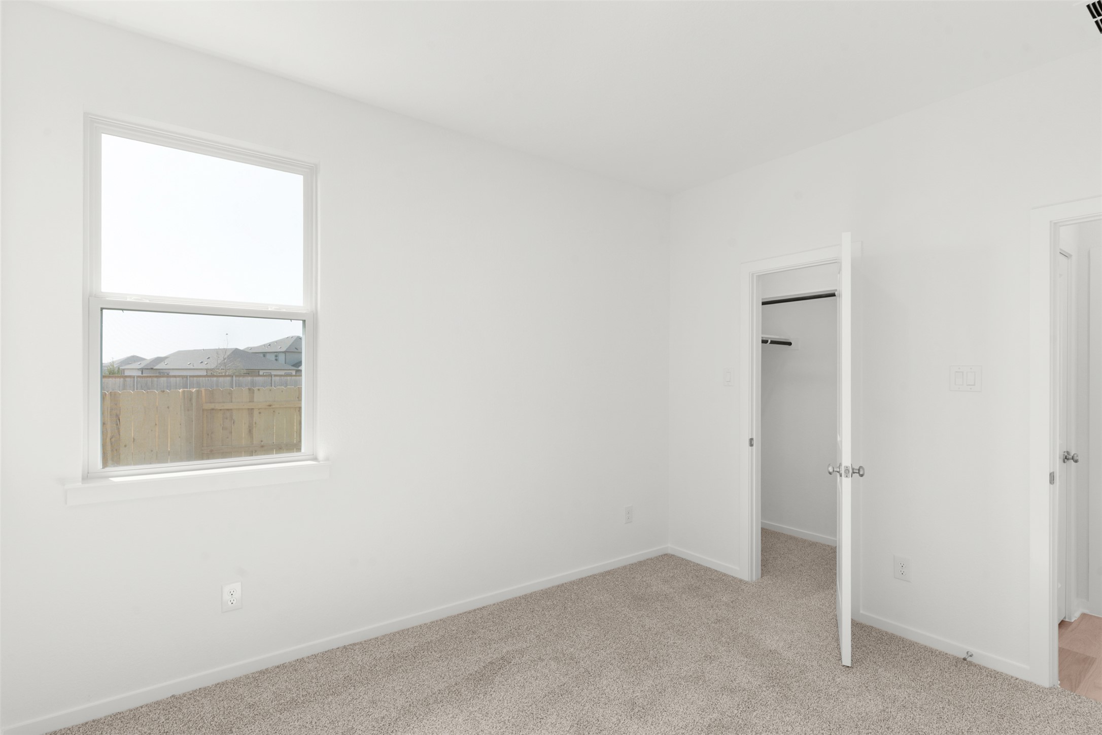 25601 Flora Bella Lane Elgin, TX 78621 - Photo 19 of 27 an empty room with a window