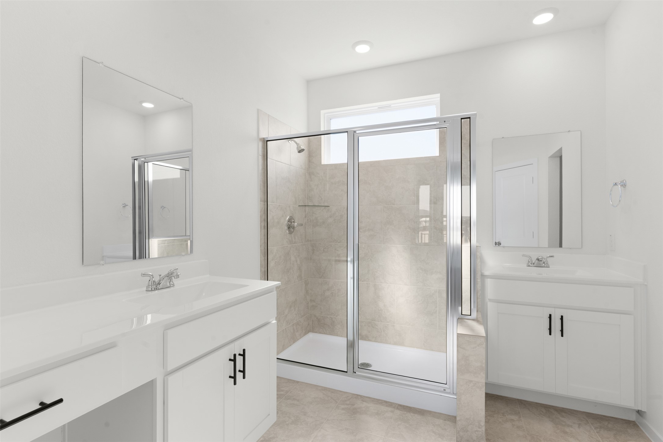 25601 Flora Bella Lane Elgin, TX 78621 - Photo 24 of 27 a bathroom with a shower sink and mirror