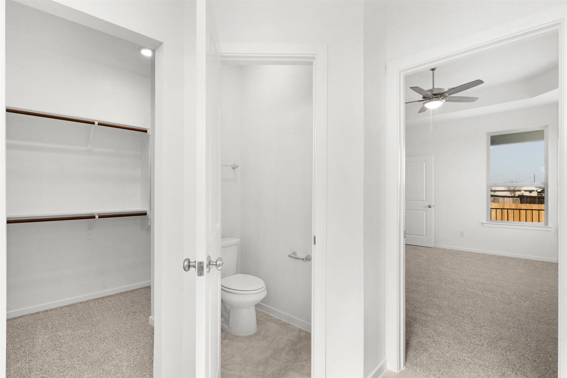 25601 Flora Bella Lane Elgin, TX 78621 - Photo 25 of 27 a bathroom with a toilet and a shower