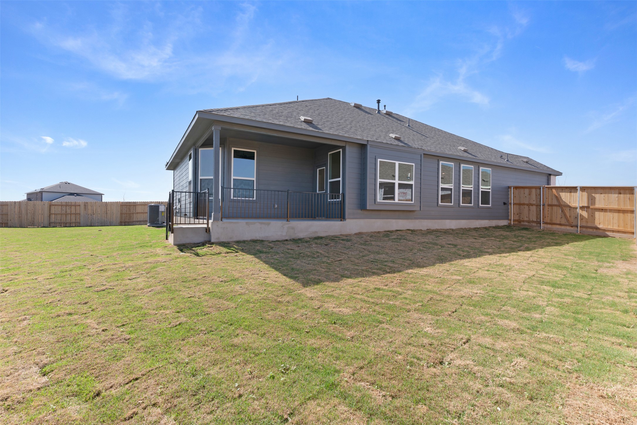 25601 Flora Bella Lane Elgin, TX 78621 - Photo 27 of 27 a front view of a house with a yard