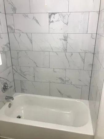 a bathroom with a bathtub