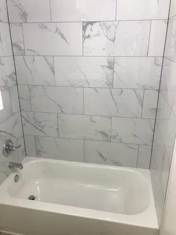 a bathroom with a bathtub