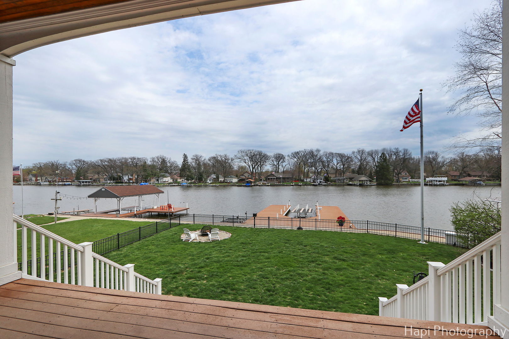 1828 Orchard Beach Road McHenry, IL 60050 - Photo 22 of 80 a view of a lake with houses in back