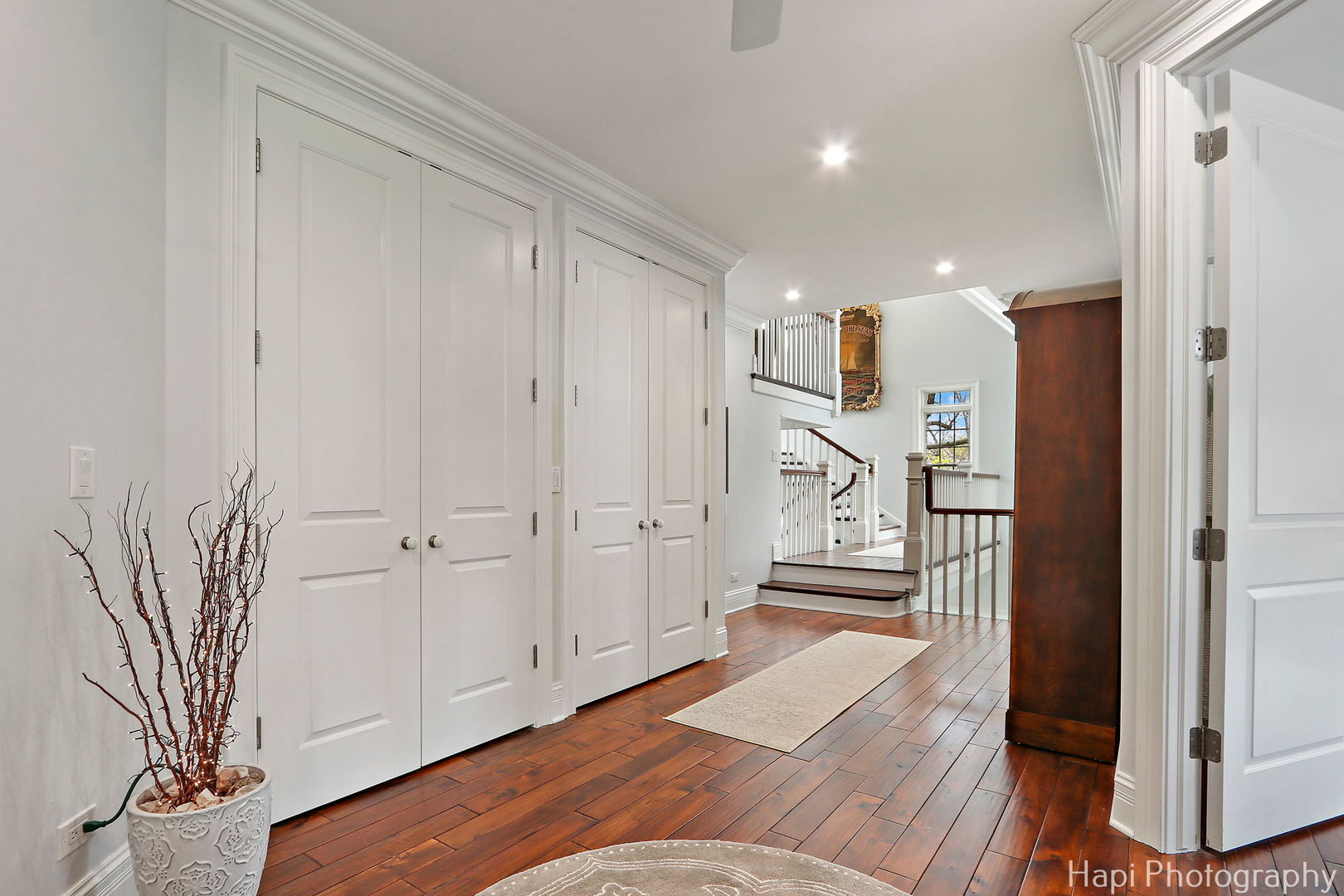 1828 Orchard Beach Road McHenry, IL 60050 - Photo 58 of 80 a view of a hallway with wooden floor and cabinet