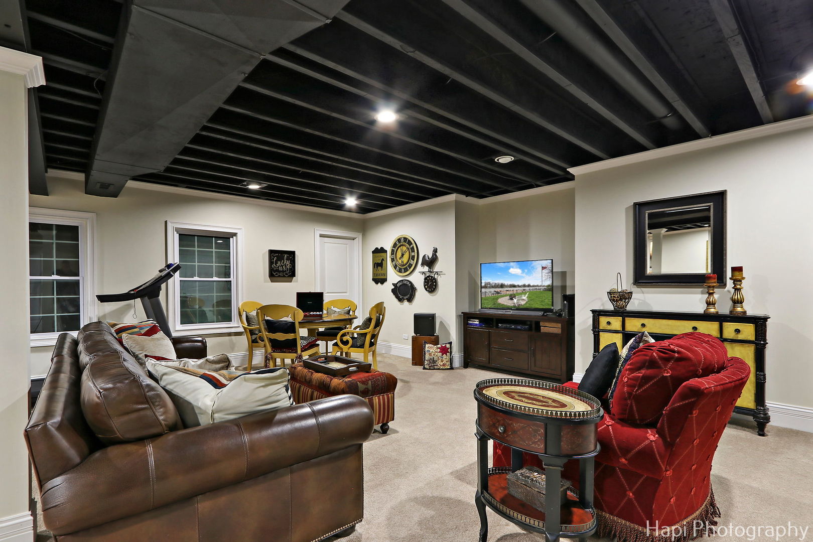 1828 Orchard Beach Road McHenry, IL 60050 - Photo 63 of 80 a living room with furniture and a flat screen tv