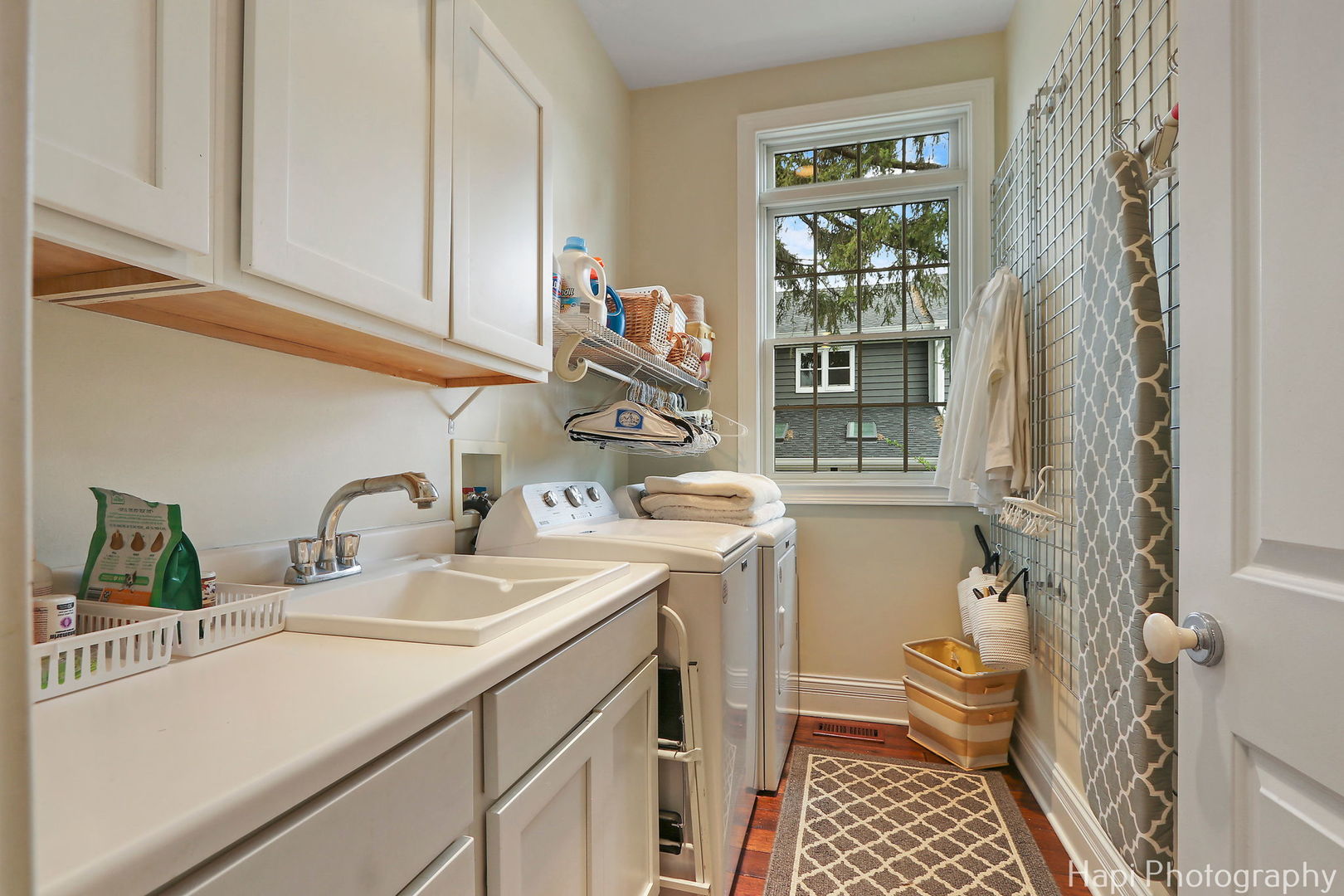 1828 Orchard Beach Road McHenry, IL 60050 - Photo 66 of 80 a kitchen with a sink and a toilet