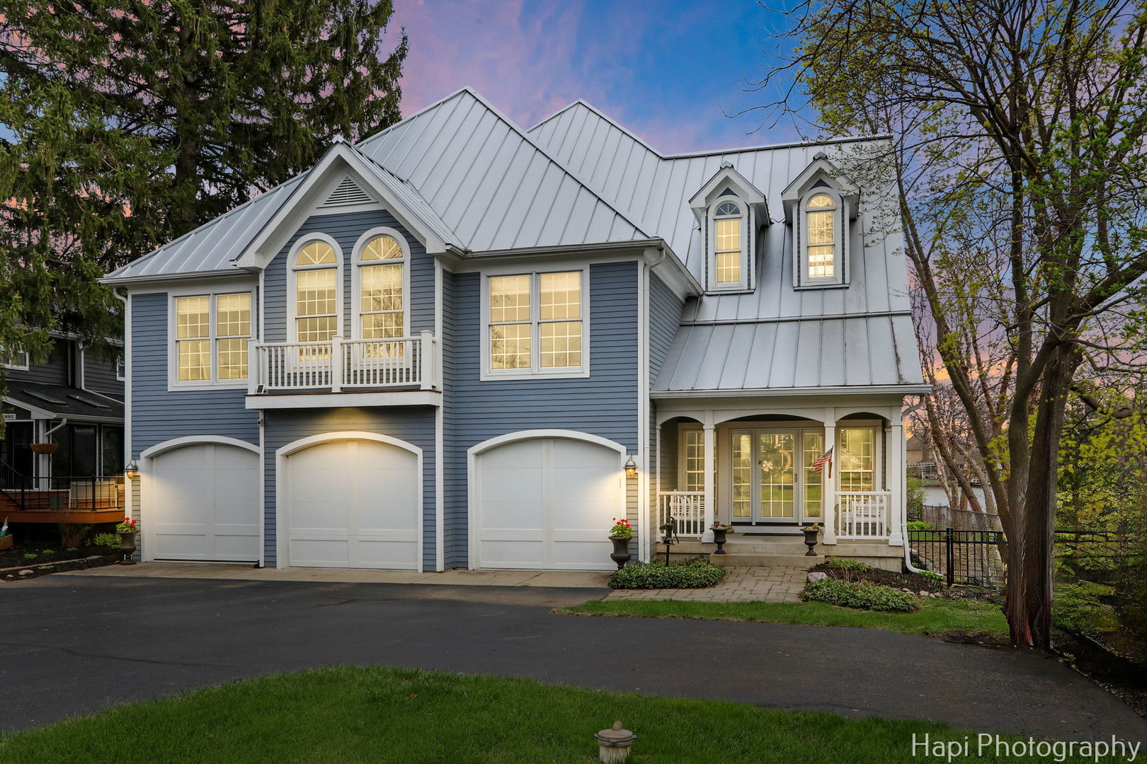 1828 Orchard Beach Road McHenry, IL 60050 - Photo 76 of 80 a front view of a house with garden