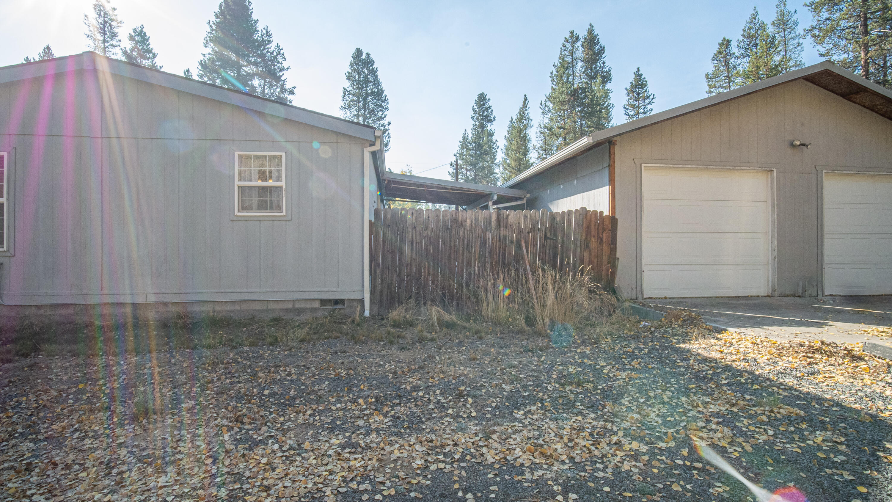 52911 Day Road La Pine, OR 97739 - Photo 3 of 34 Detached garage with 2 doors and a metal roof