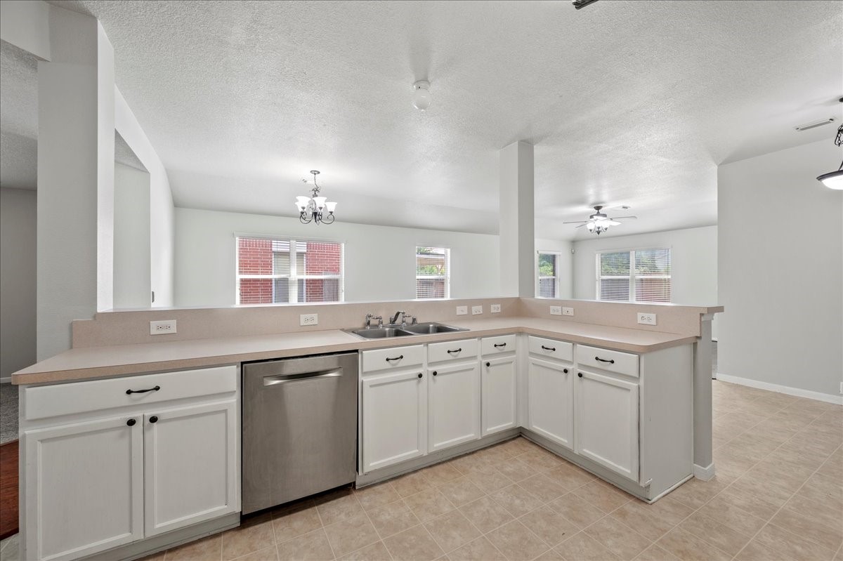 17535 Prospect Meadows Drive Houston, TX 77095 - Photo 13 of 39 Ample counter space provides plenty of room for meal prep, while abundant cabinetry offers excellent storage options to keep everything organized and within reach.