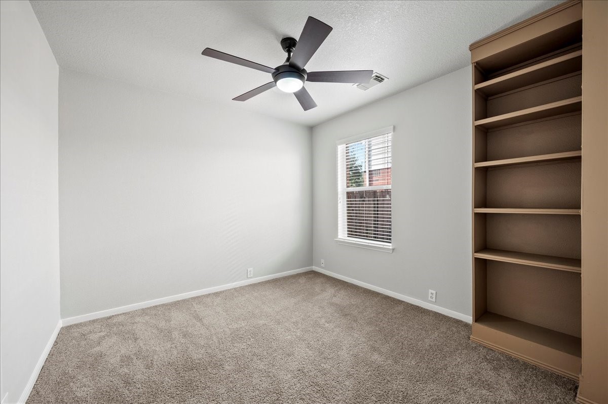 17535 Prospect Meadows Drive Houston, TX 77095 - Photo 26 of 39 The spacious bedrooms offer plenty of space for a bed and furnishings, allowing for personalization. Generous closet space ensures that belongings can be easily organized and stored.