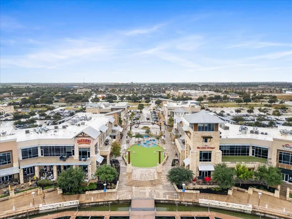 a view of a lake with a city