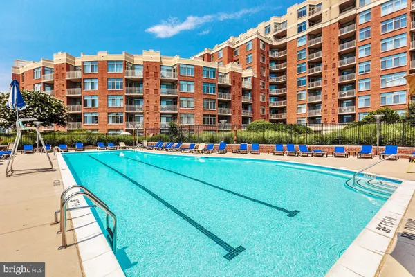 a view of swimming pool with patio