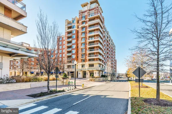 a room with furniture pool table and windows
