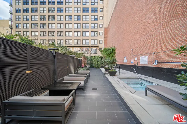 a view of a terrace with furniture and potted plants