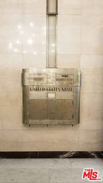 460 South Spring Street, Unit 1205 Los Angeles, CA 90013 - Photo 33 of 37 a view of a bathroom with shower