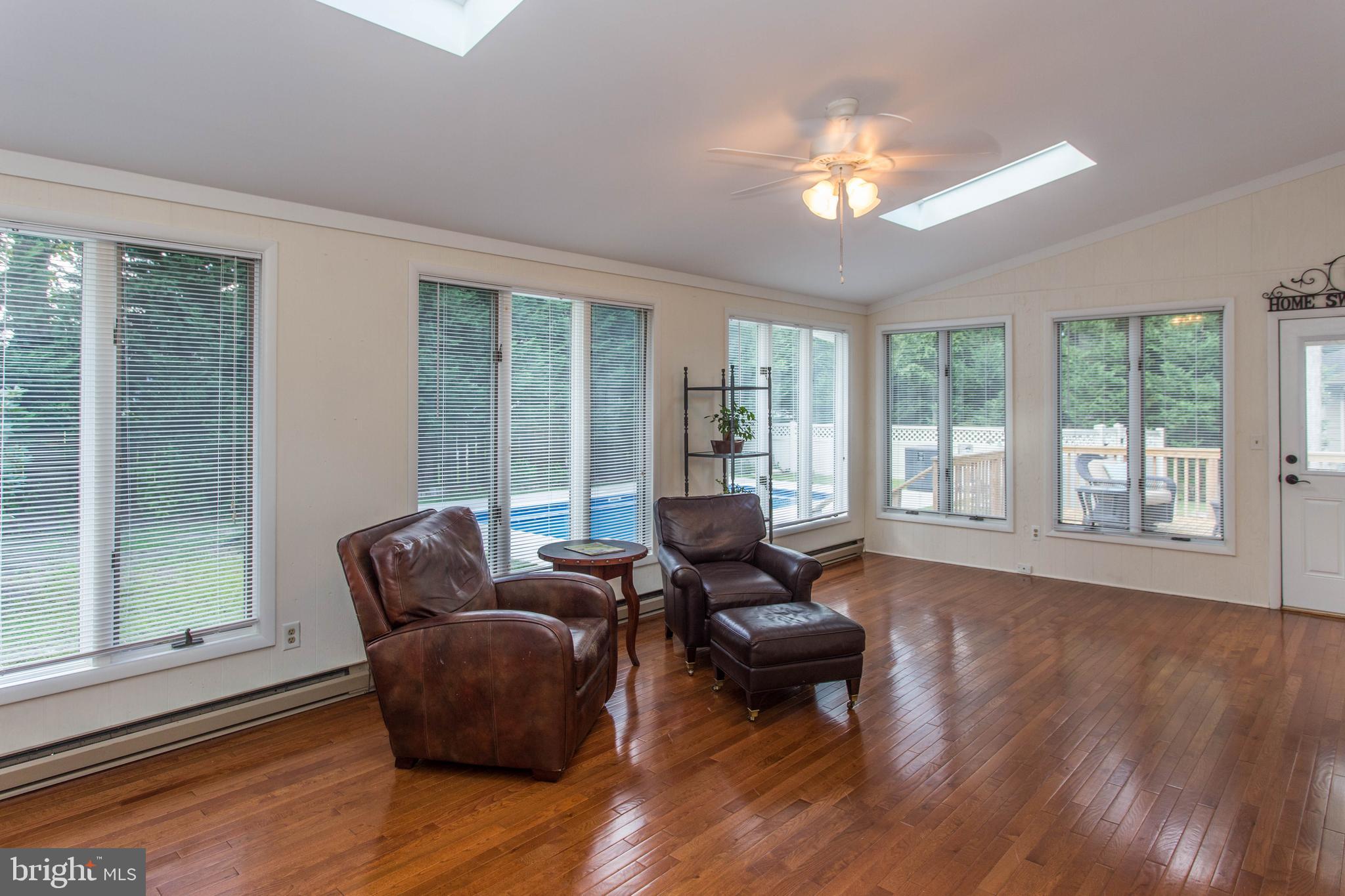 25 Coventry Road Rehoboth Beach, DE 19971 - Photo 14 of 25 Sun Room that adjoins Deck and Pool
