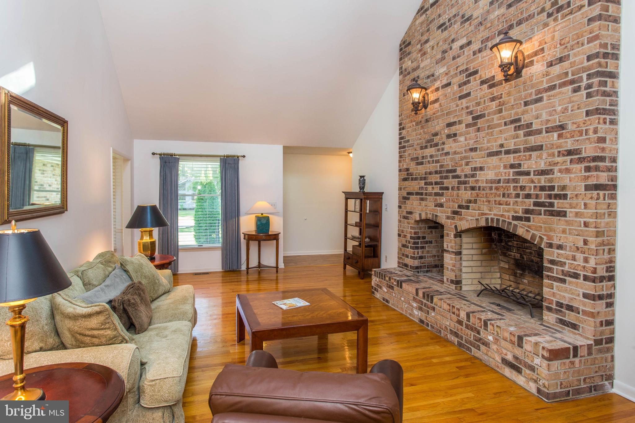 25 Coventry Road Rehoboth Beach, DE 19971 - Photo 5 of 25 Raised hearth brick Fireplace*Wood storage