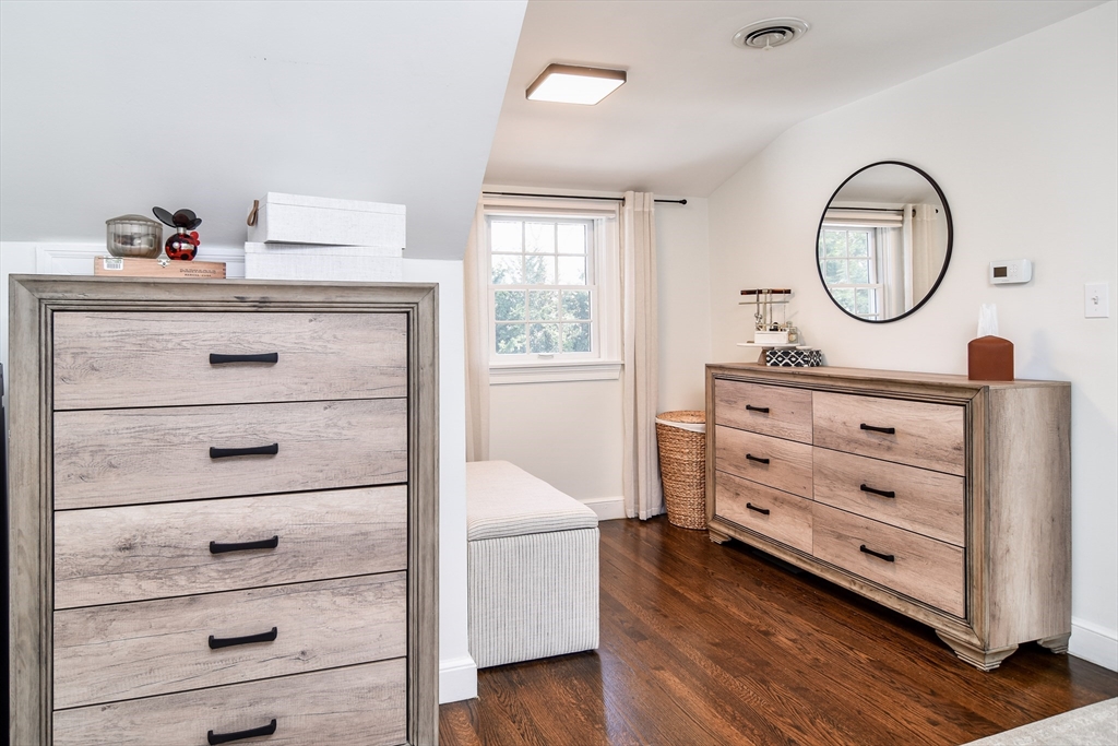52 Wesley Road Framingham, MA 01701 - Photo 15 of 29 a view of a dresser in it and wooden floor