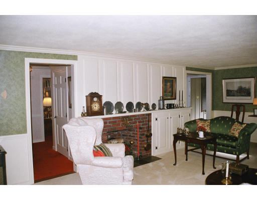 61 Hillcrest Road Concord, MA 01742 - Photo 6 of 11 a living room with furniture and a flat screen tv