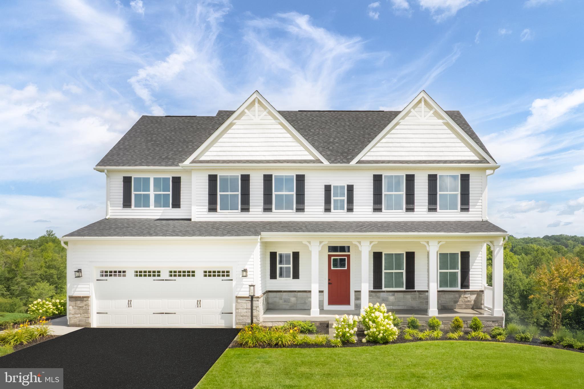 a view of house with yard and green space
