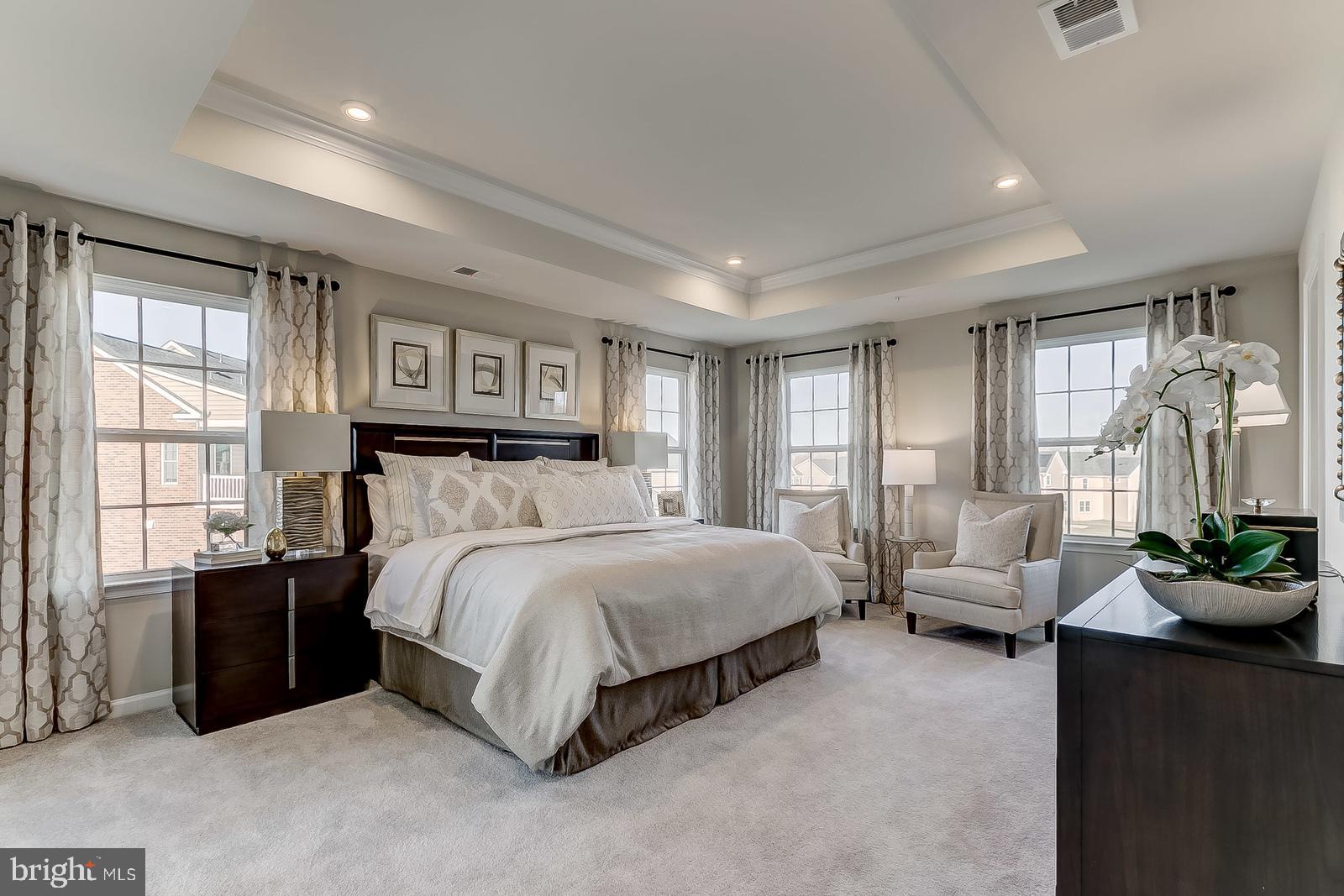 6 Bayard Reading, PA 19606 - Photo 5 of 9 a spacious bedroom with a bed and a couch