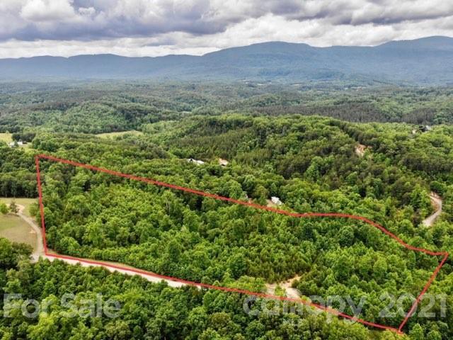 0 Bill Jackson Road Mill Spring, NC 28756 - Photo 1 of 24 an aerial view of houses covered in trees