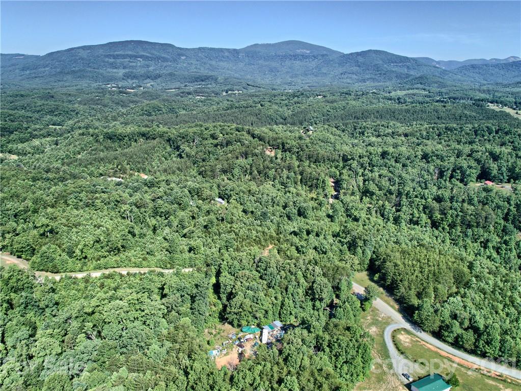 0 Bill Jackson Road Mill Spring, NC 28756 - Photo 9 of 24 a view of a mountain with a yard