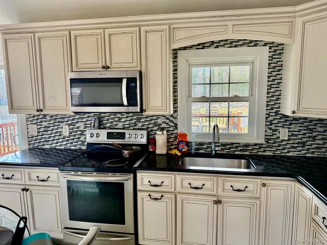 $585,000 | 359 Wellwood Drive, Shirley, NY 11967