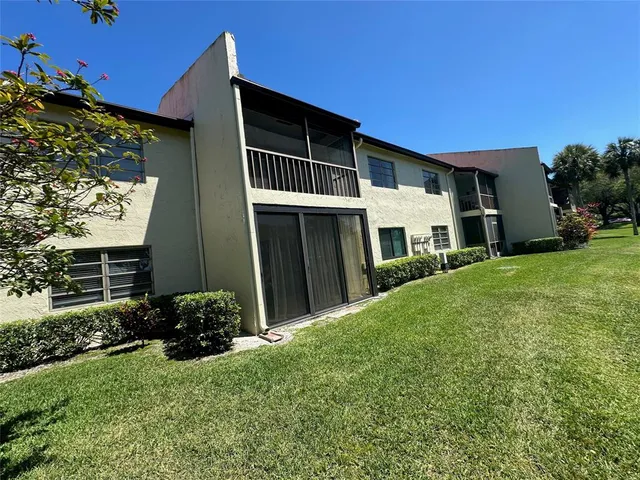 a house view with a backyard space