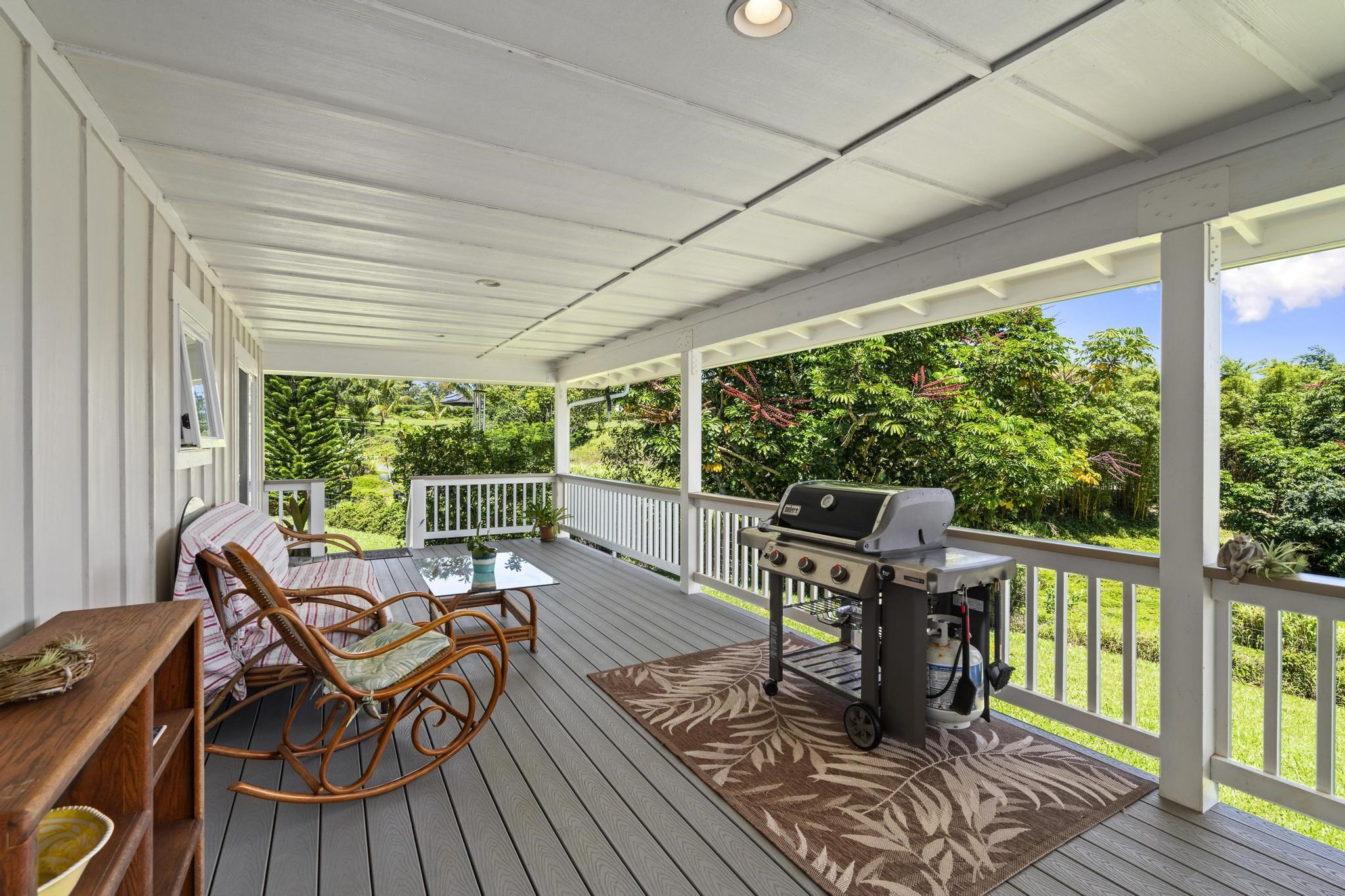 896 Hoomalolo Place, Unit B Haiku, HI 96708 - Photo 11 of 44 a view of a patio with wooden floor