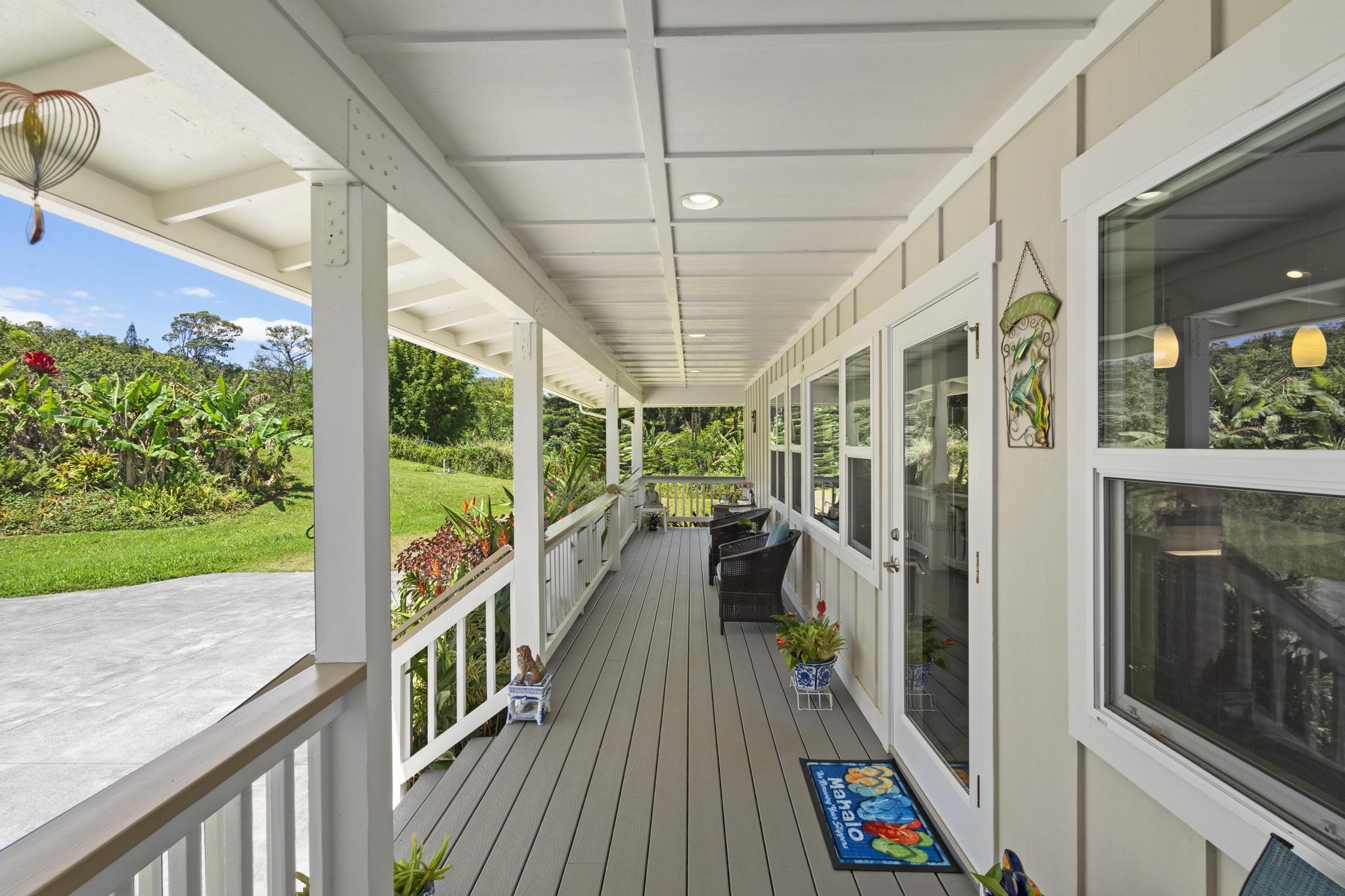 896 Hoomalolo Place, Unit B Haiku, HI 96708 - Photo 14 of 44 a view of a balcony with furniture and wooden floor