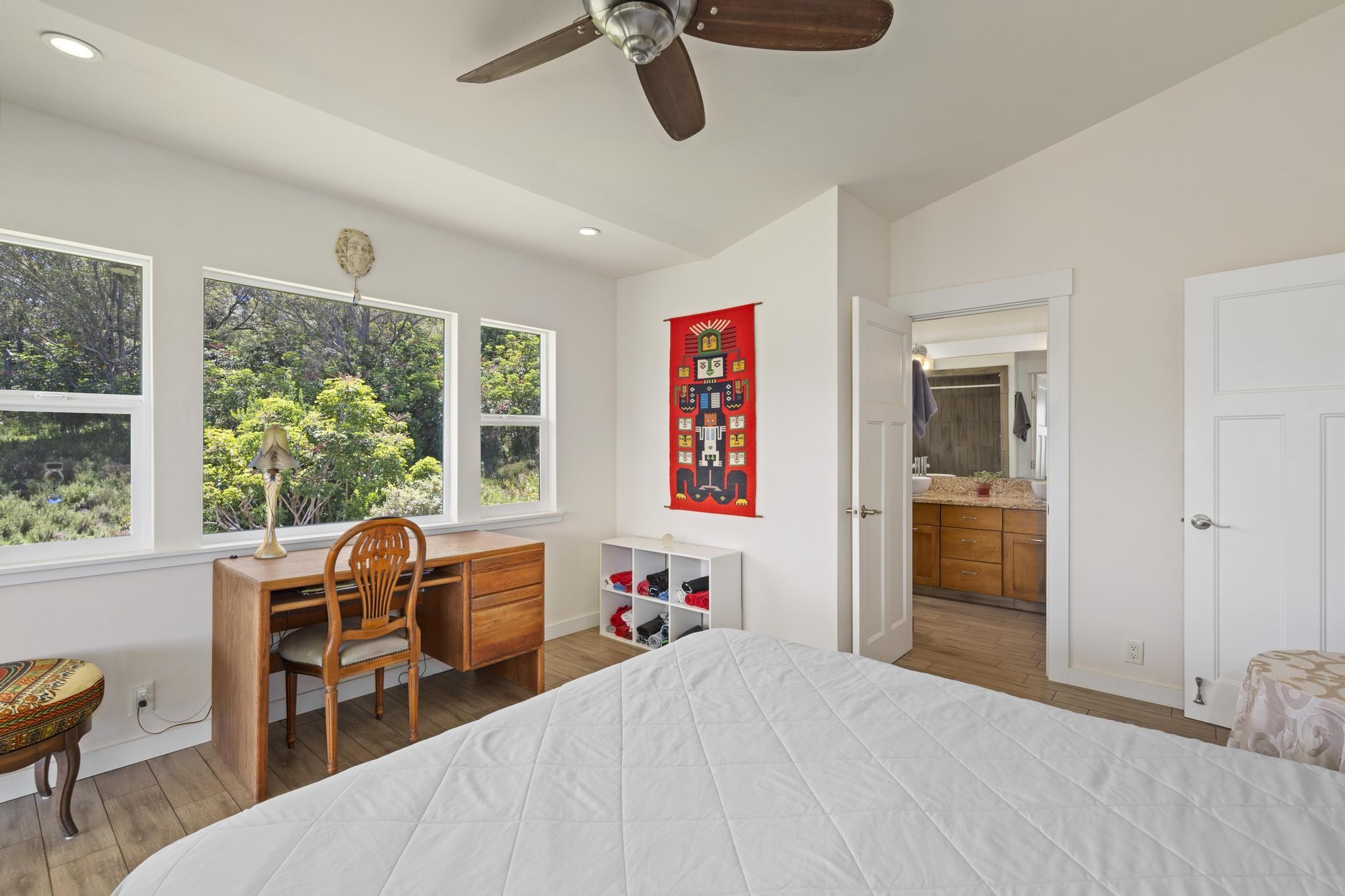 896 Hoomalolo Place, Unit B Haiku, HI 96708 - Photo 25 of 44 a room with furniture and a window