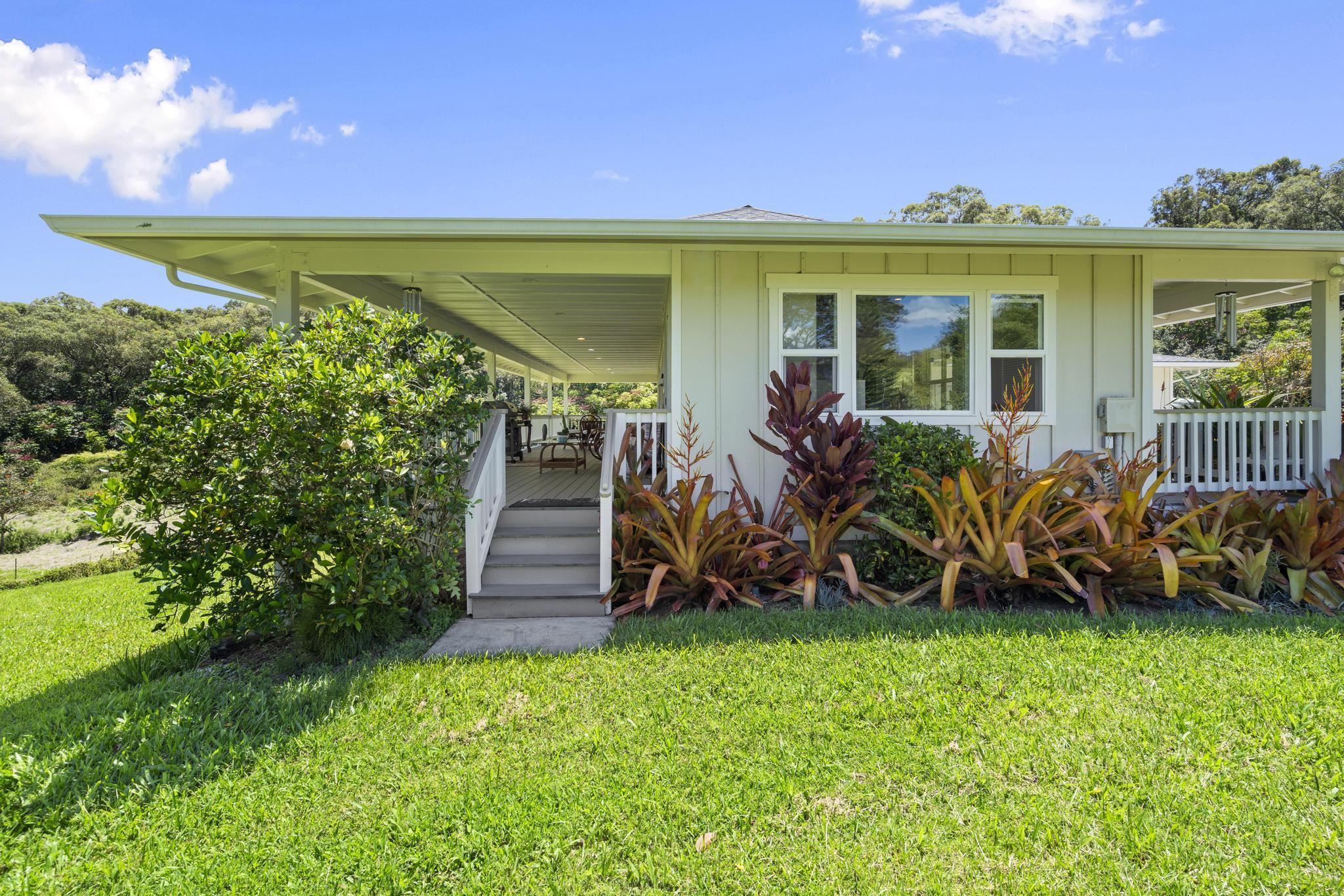 896 Hoomalolo Place, Unit B Haiku, HI 96708 - Photo 34 of 44 a view of a house with garden